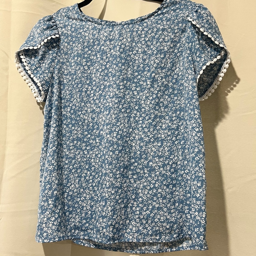 Floral print blue blouse